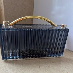 Elegant Black Clutch with Gold Handle